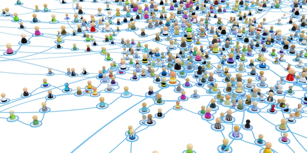Crowd of small symbolic 3d figures linked by lines.