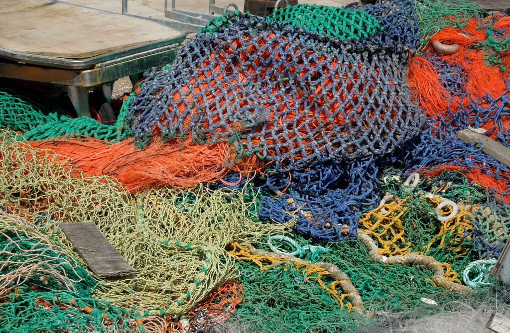 heap of multicoloured fishing nets in Swanage