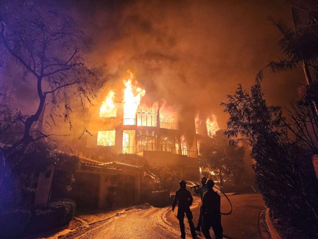 House on fire during the 2025 Palisades fire